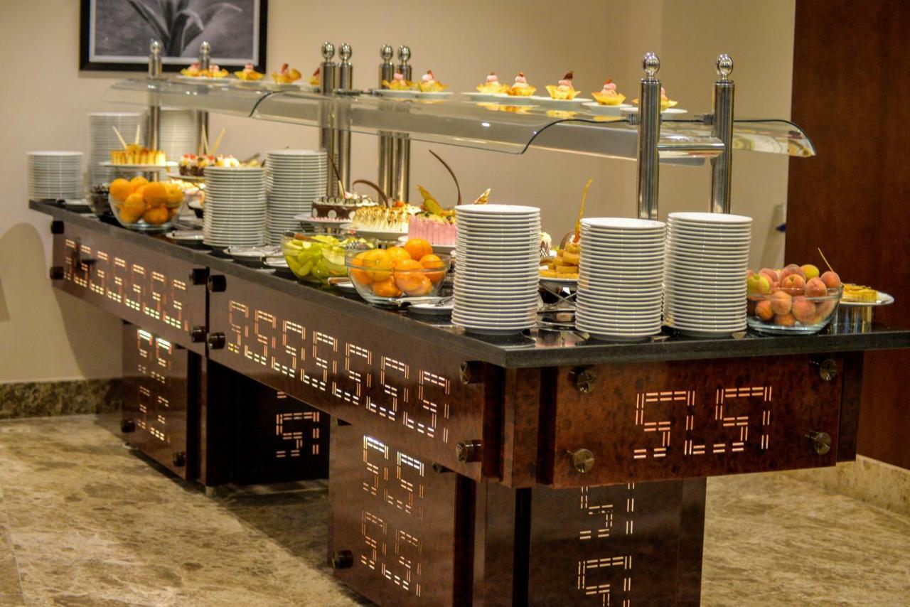 톨리프 엘 나르게스 호텔 앤 스파 카이로 외부 사진 A buffet